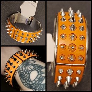 Orange spiked punk bangle bracelet